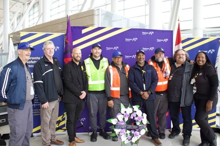 a group of people posing for a photo