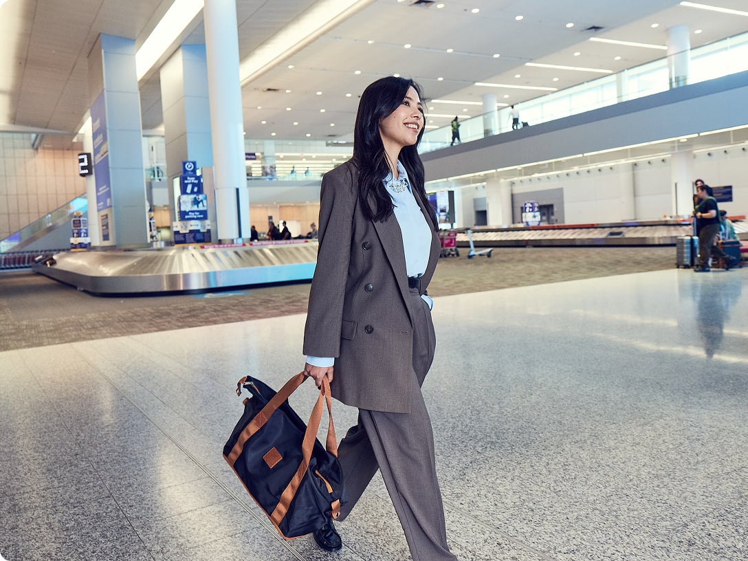 a person holding a suitcase