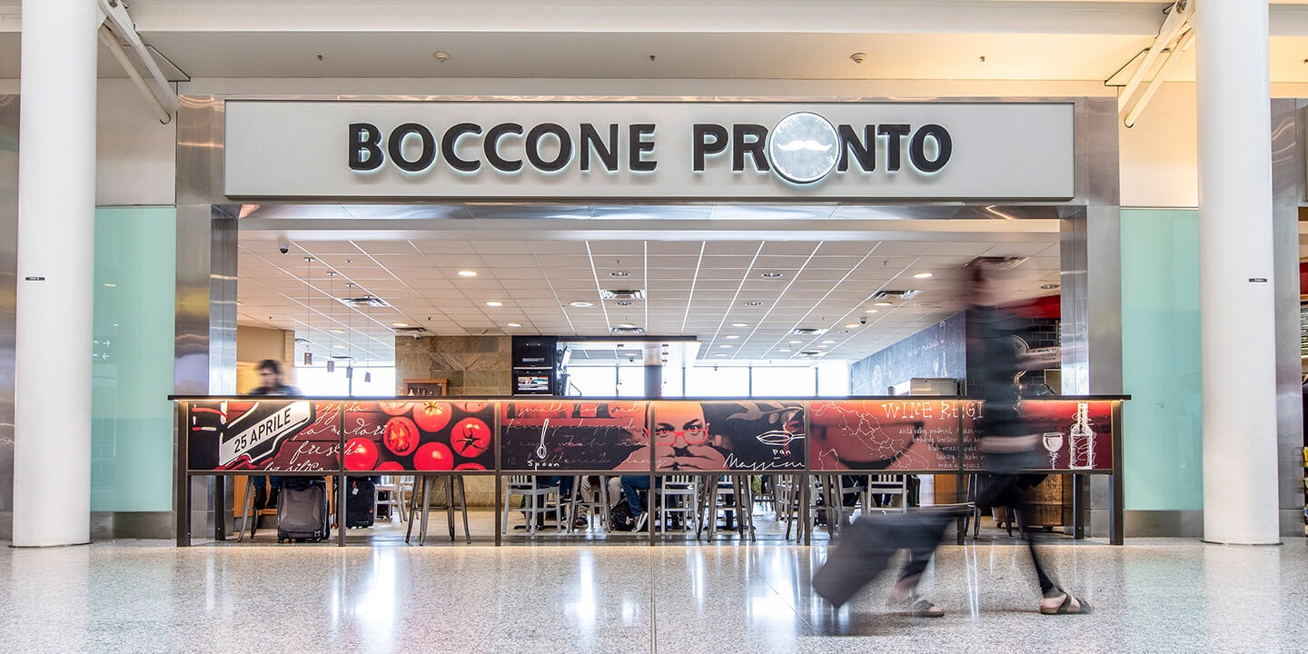Boccone Pronto sign and front of the restaurant. 