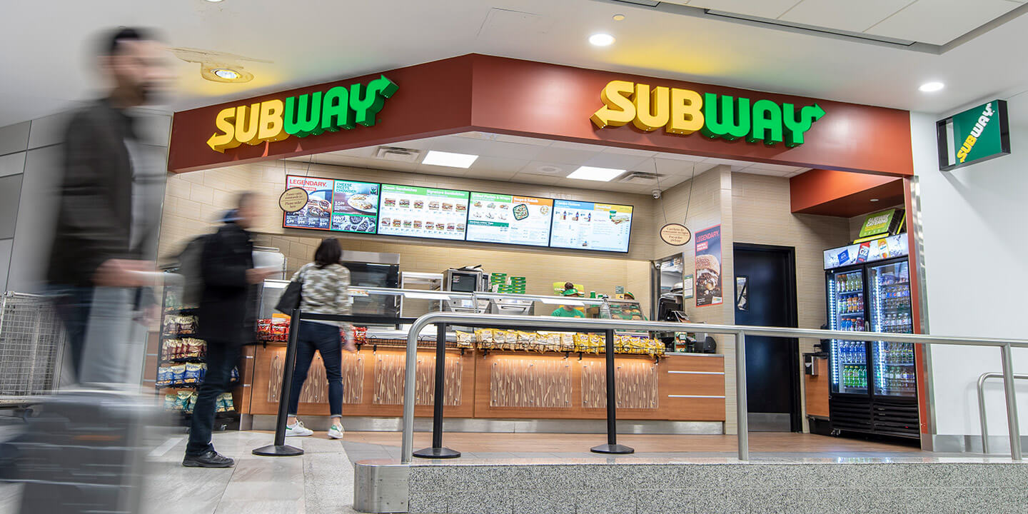 Subway counter and small area for lineup with belt barrier