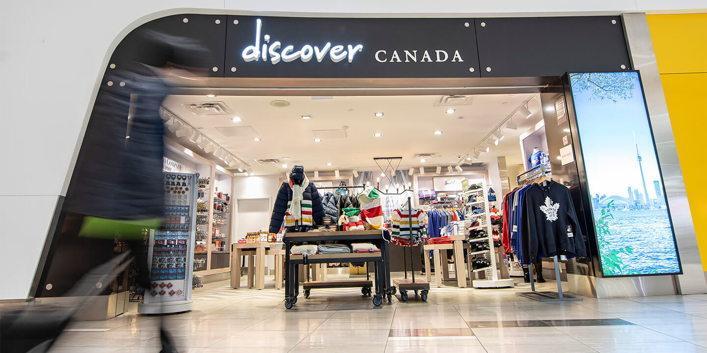 Discover Canada black sign above the store with a view in 