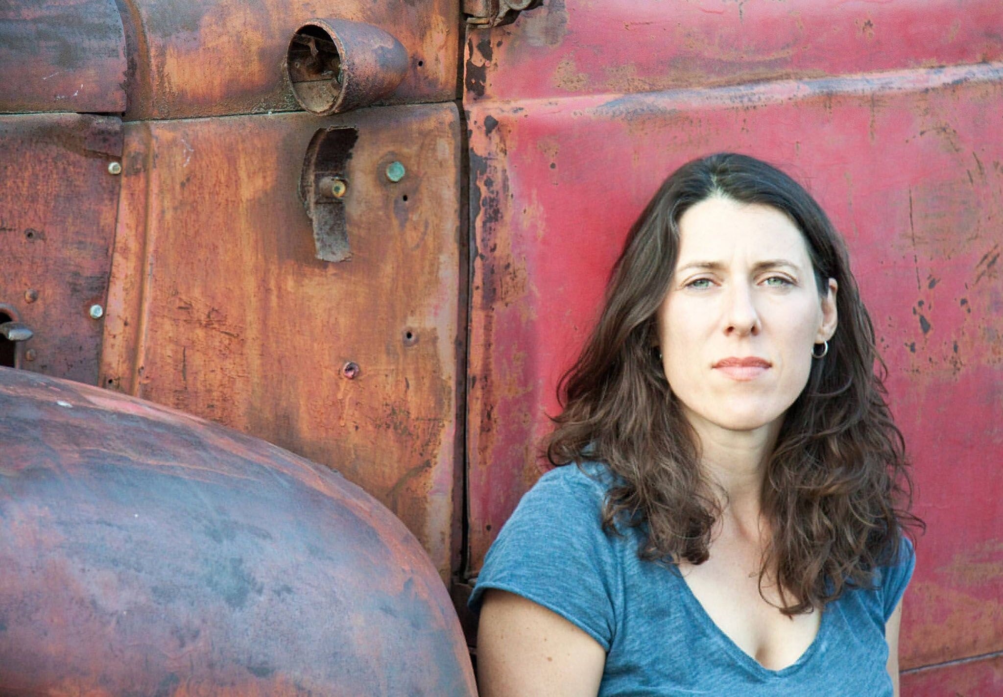 Annabell Chvostek in front of an old red truck